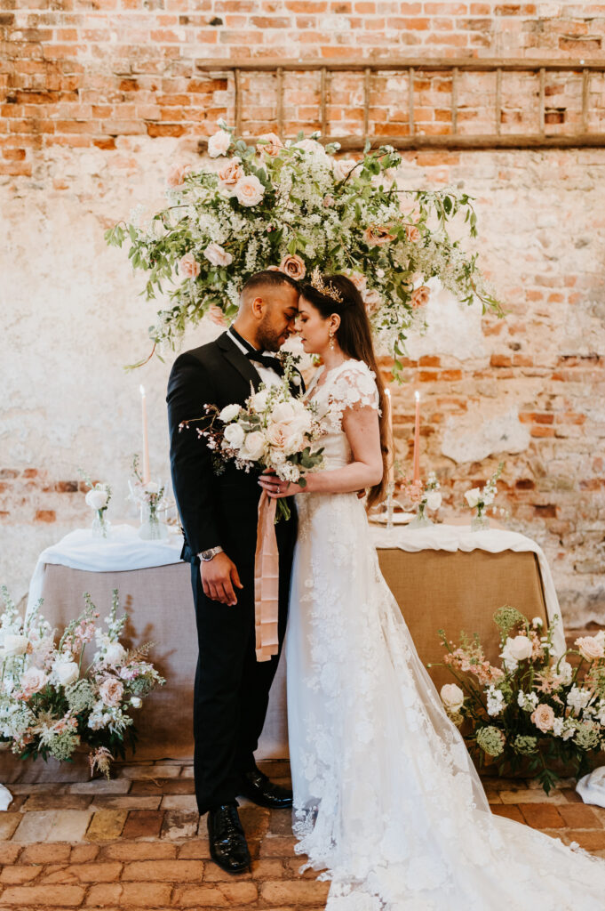 Bride and groom hanging florals