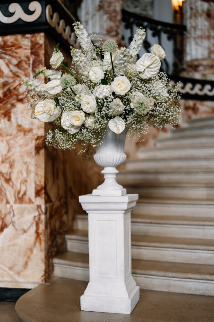 white wedding flowers in urn