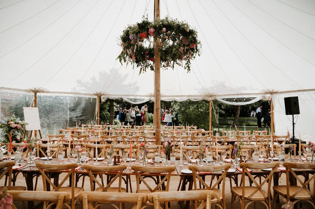 Hanging floral hoop sailcloth marquee